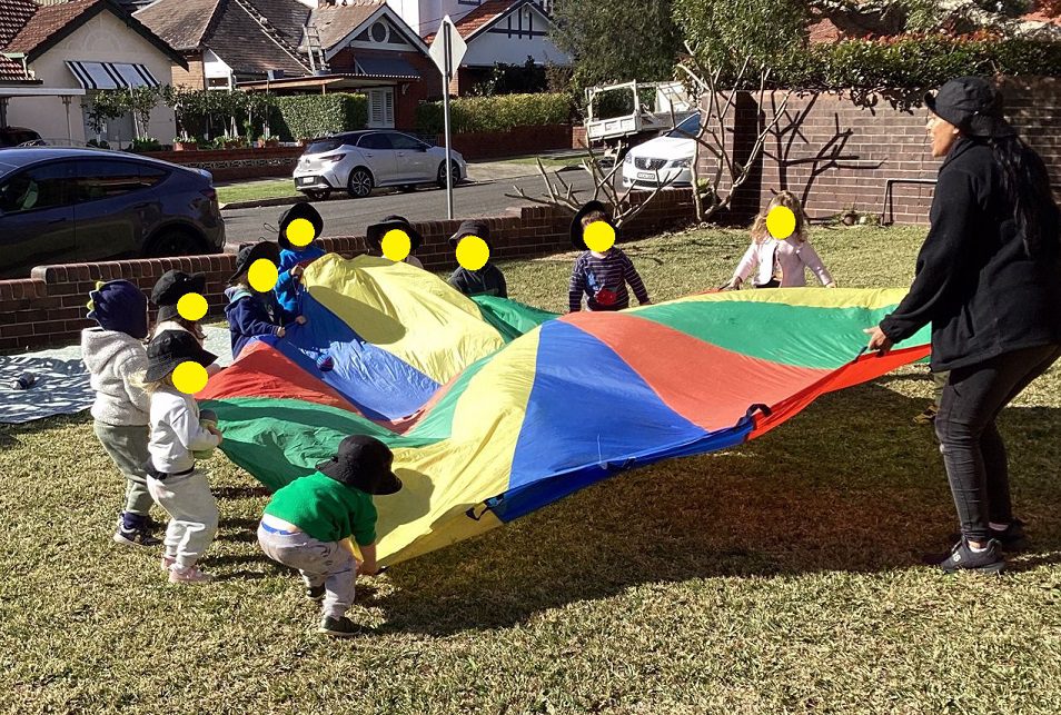 Children enjoying outdoor physical movement activities at Learn and Laugh Drummoyne childcare centre